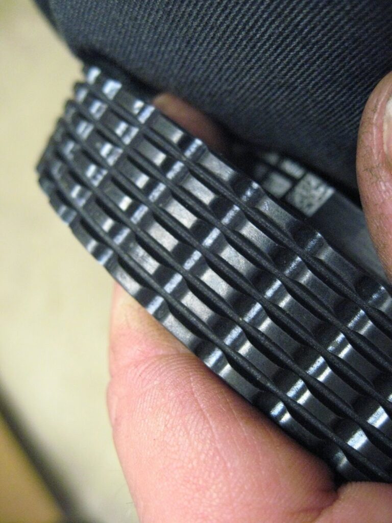 belt with shiny appearance and beveled flutes