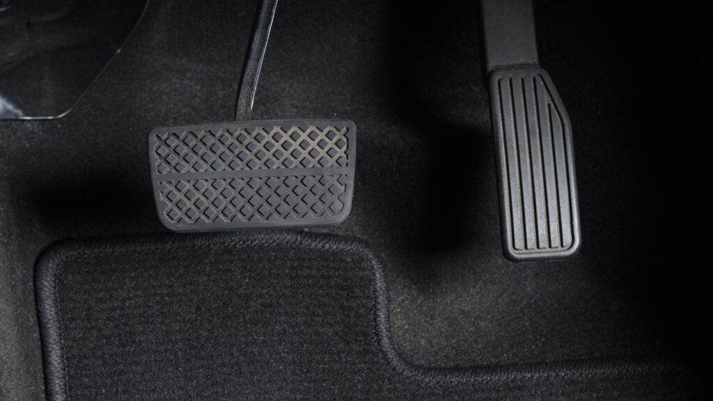 location of car brake pedal