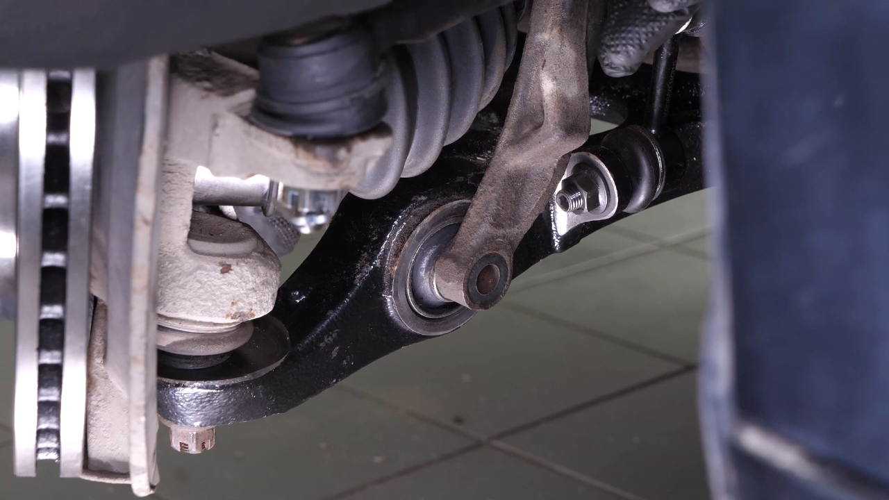 Reinstall the strut in the wheel knuckle