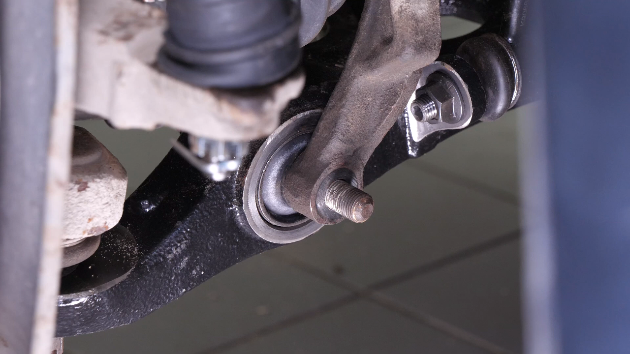 Reinstall the strut in the wheel knuckle