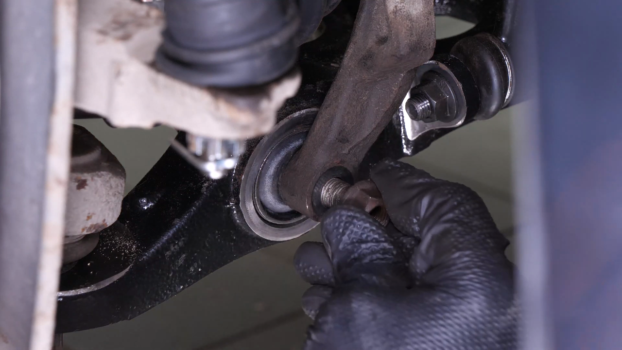 Reinstall the strut in the wheel knuckle