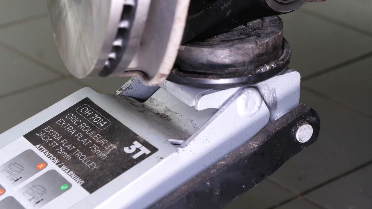 Reinstall the strut in the wheel knuckle