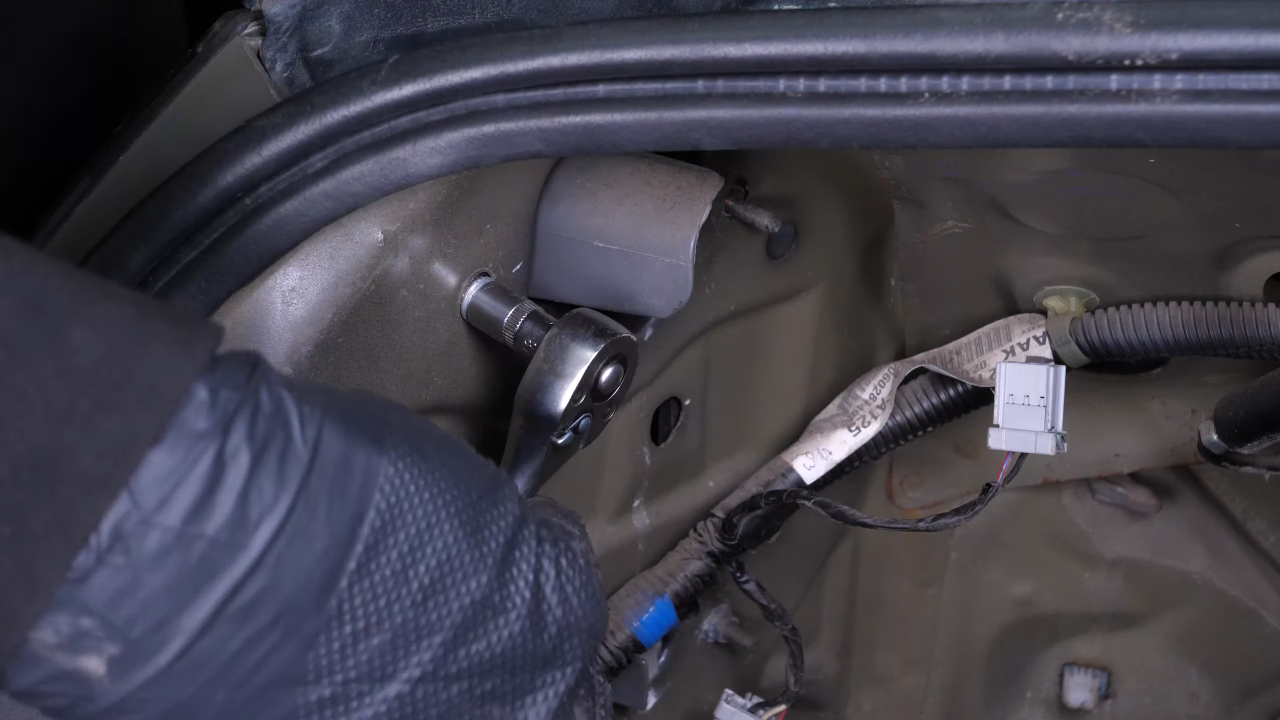 Remove the tail light housing