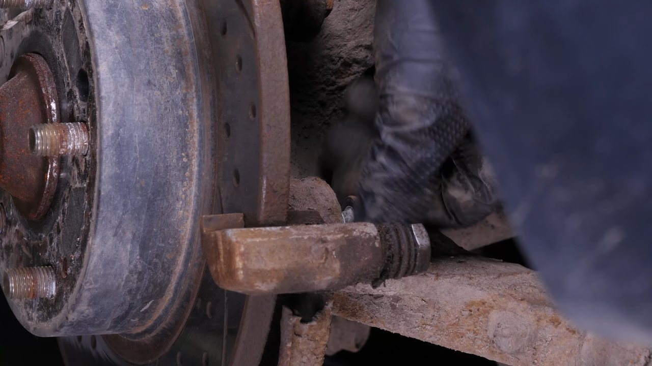 Remove the  brake caliper mount