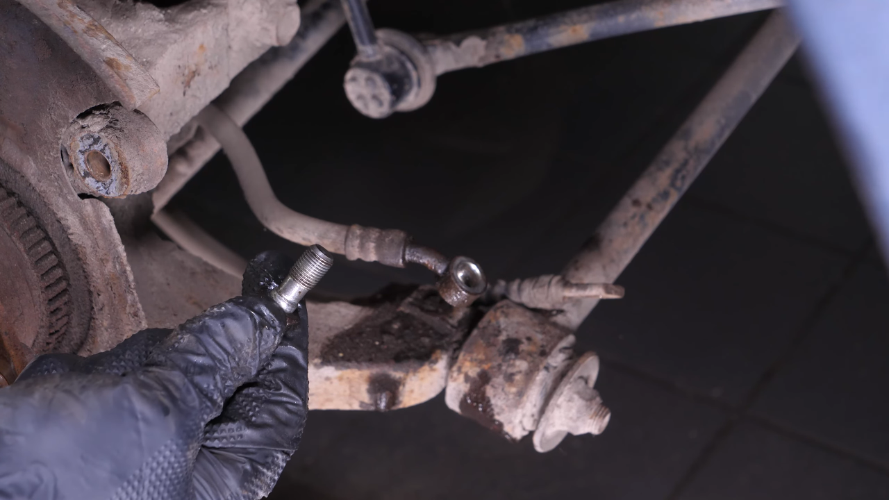Screw the brake hose back on the caliper