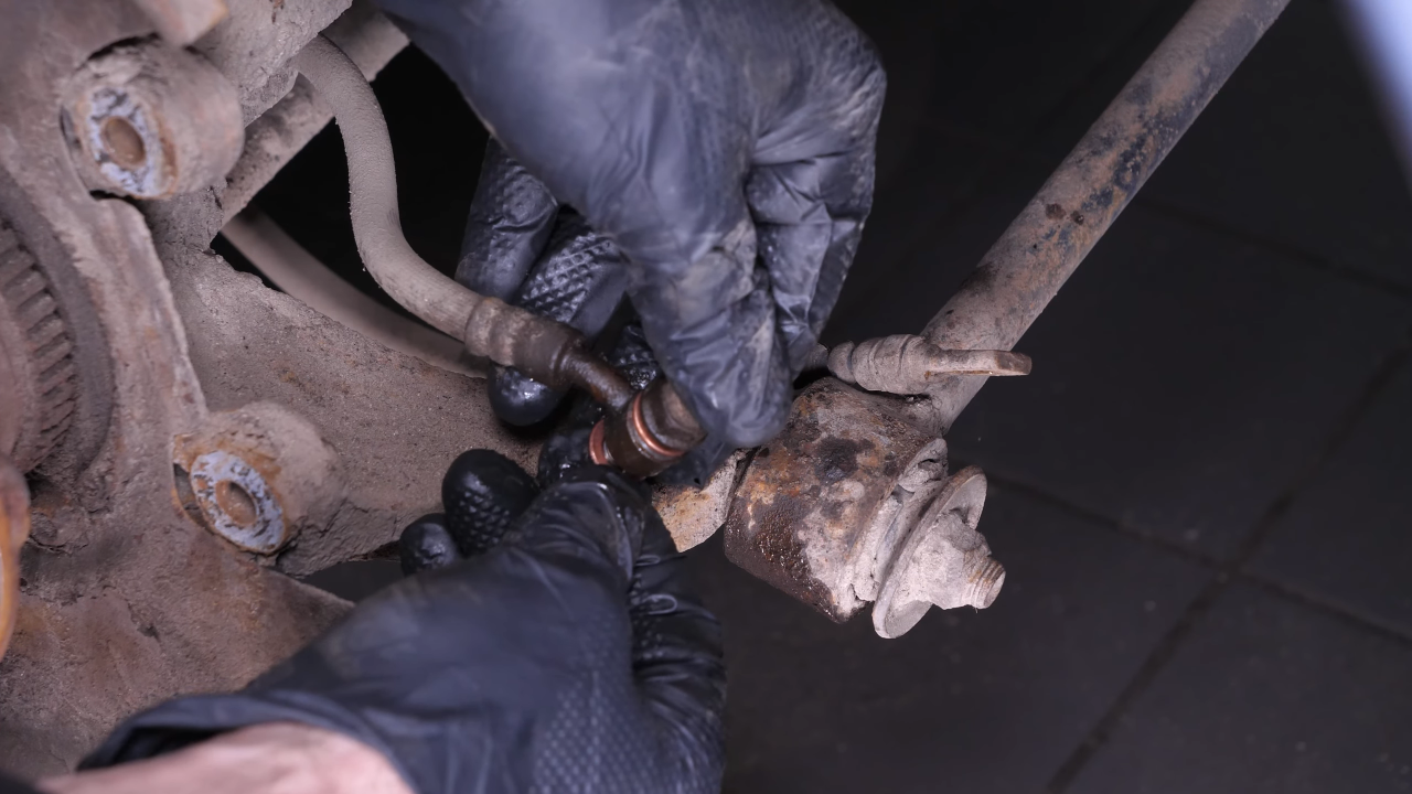Screw the brake hose back on the caliper