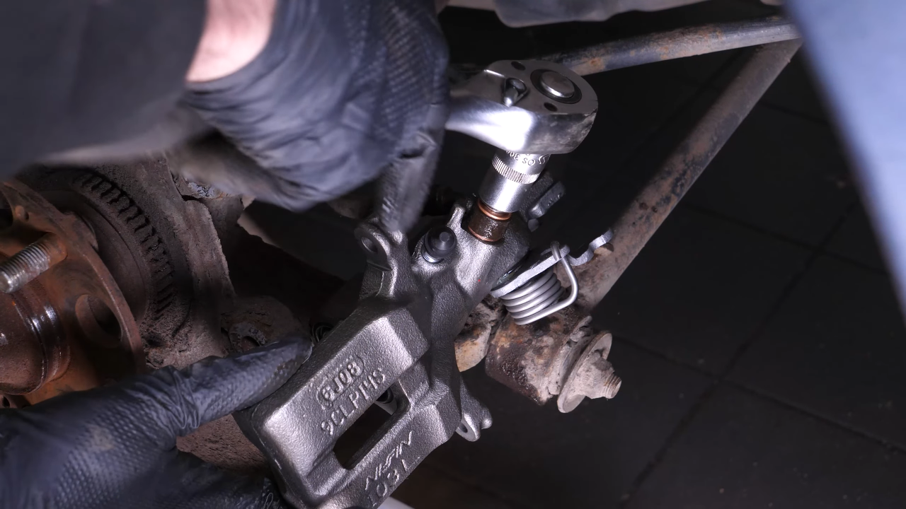 Screw the brake hose back on the caliper