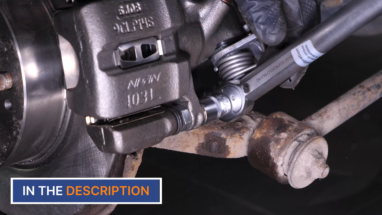 Put the brake caliper back