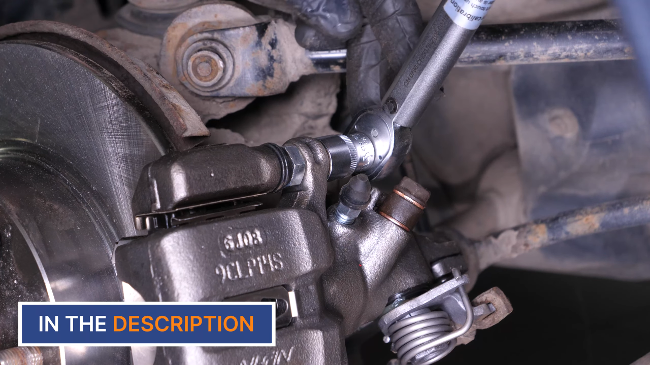 Put the brake caliper back