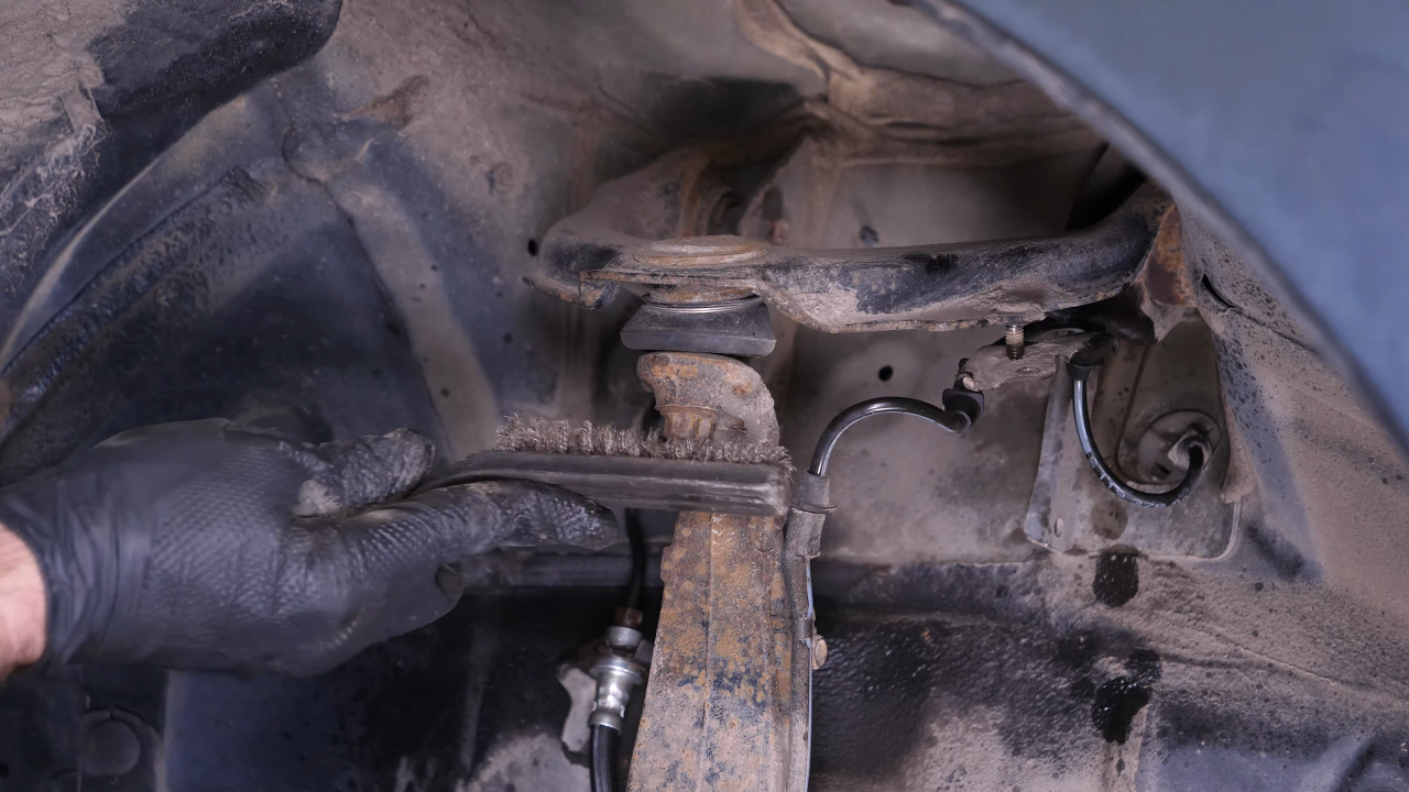 Remove the control arm ball joint