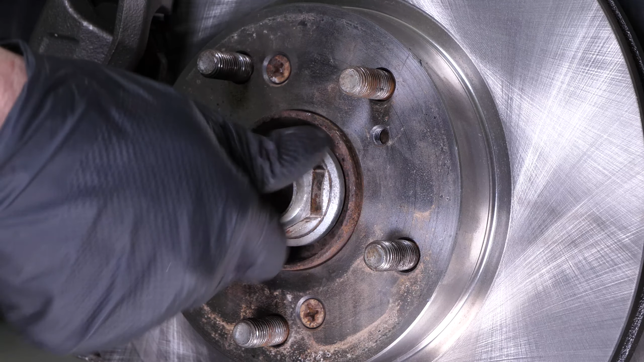 Unscrew the CV axle nut