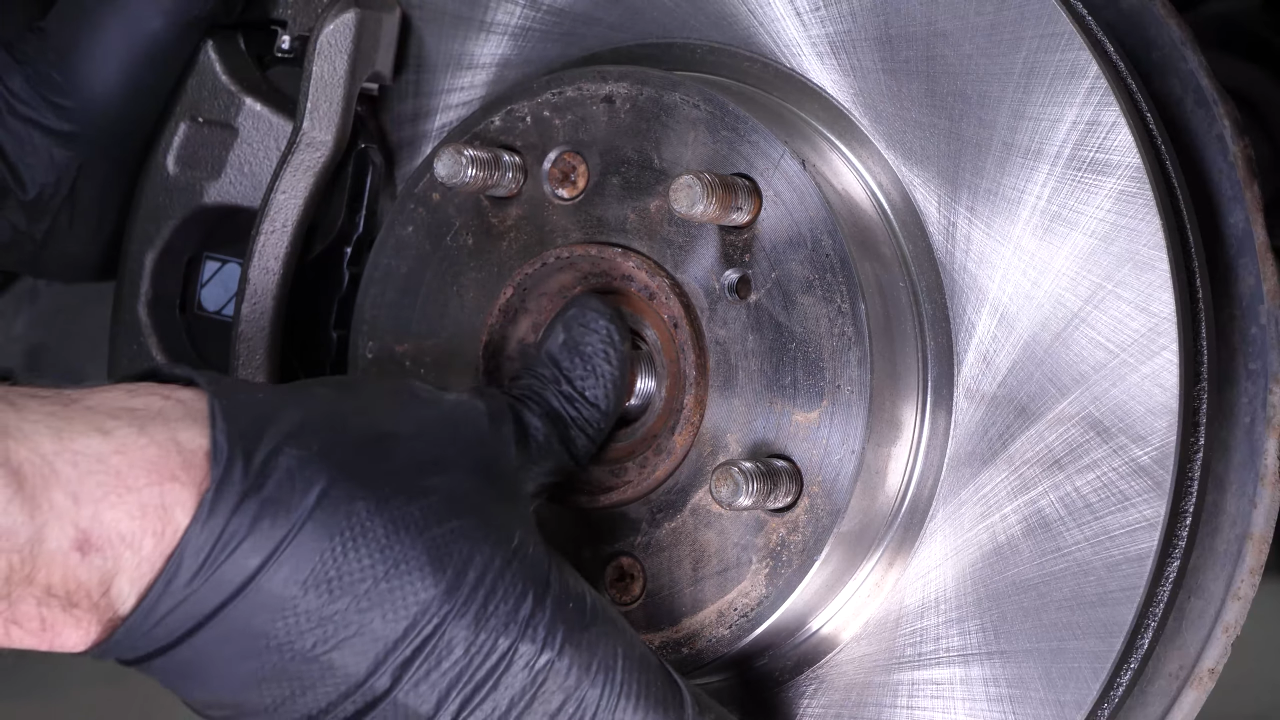 Unscrew the CV axle nut