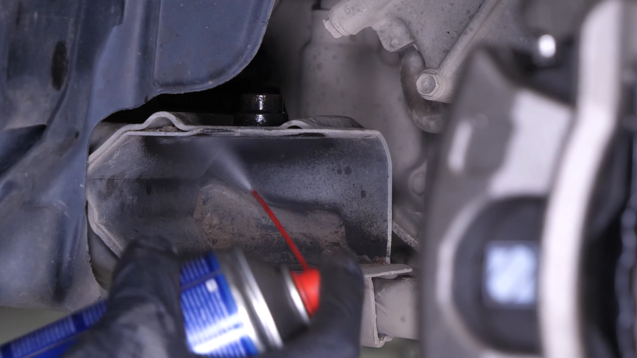 Put the control arm back
