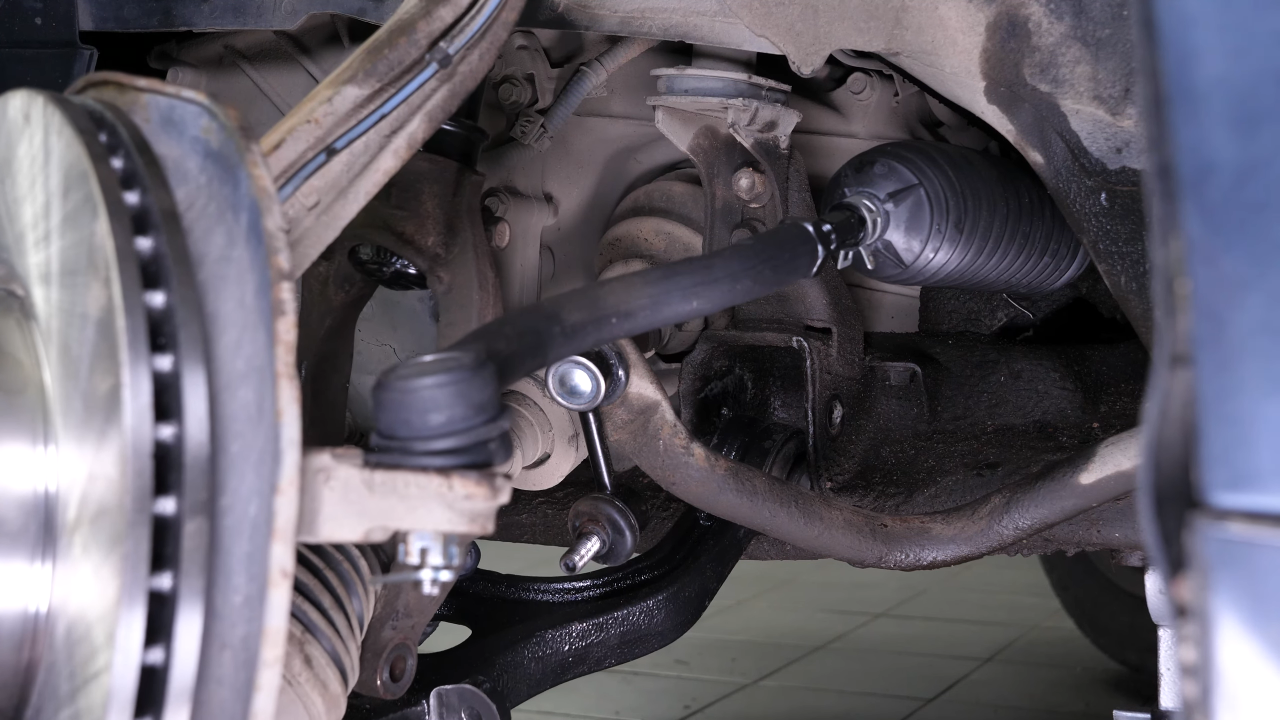 Put the control arm back
