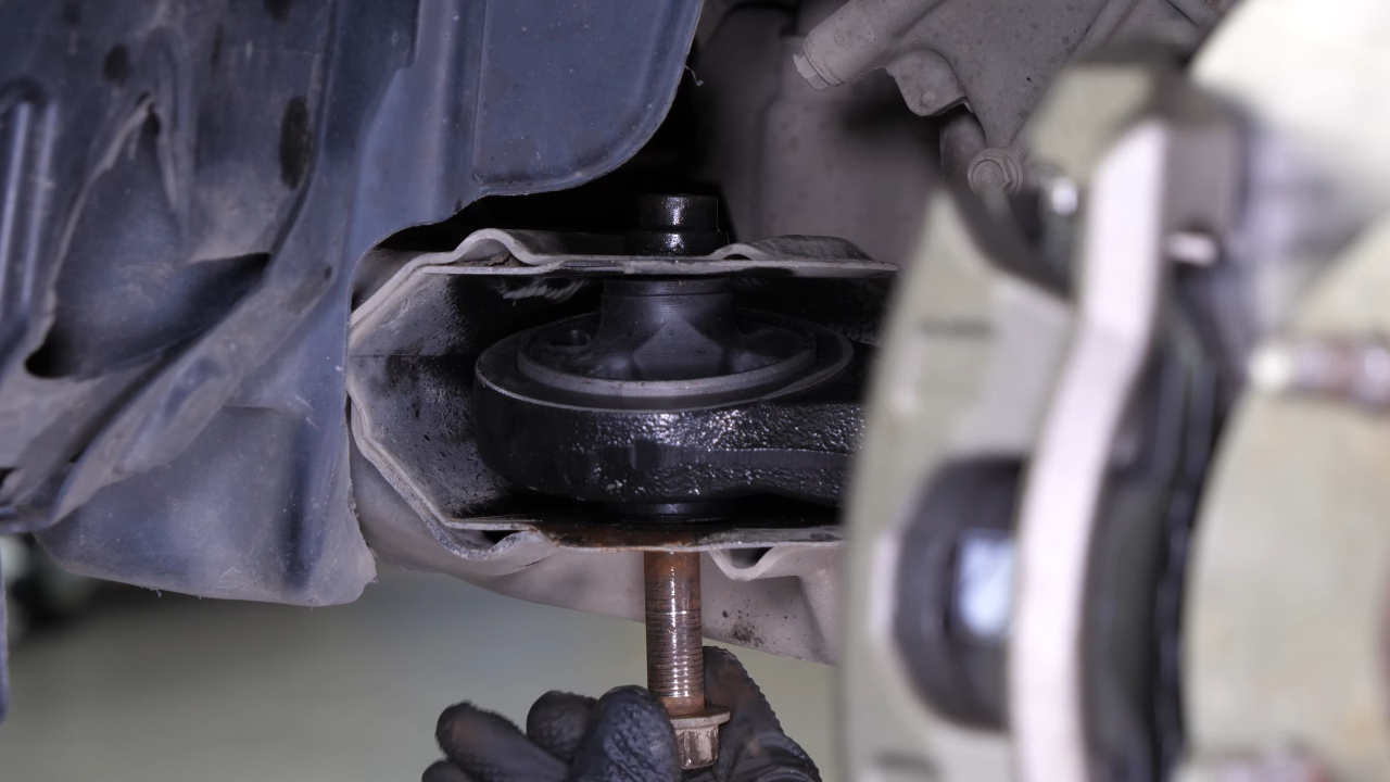 Put the control arm back