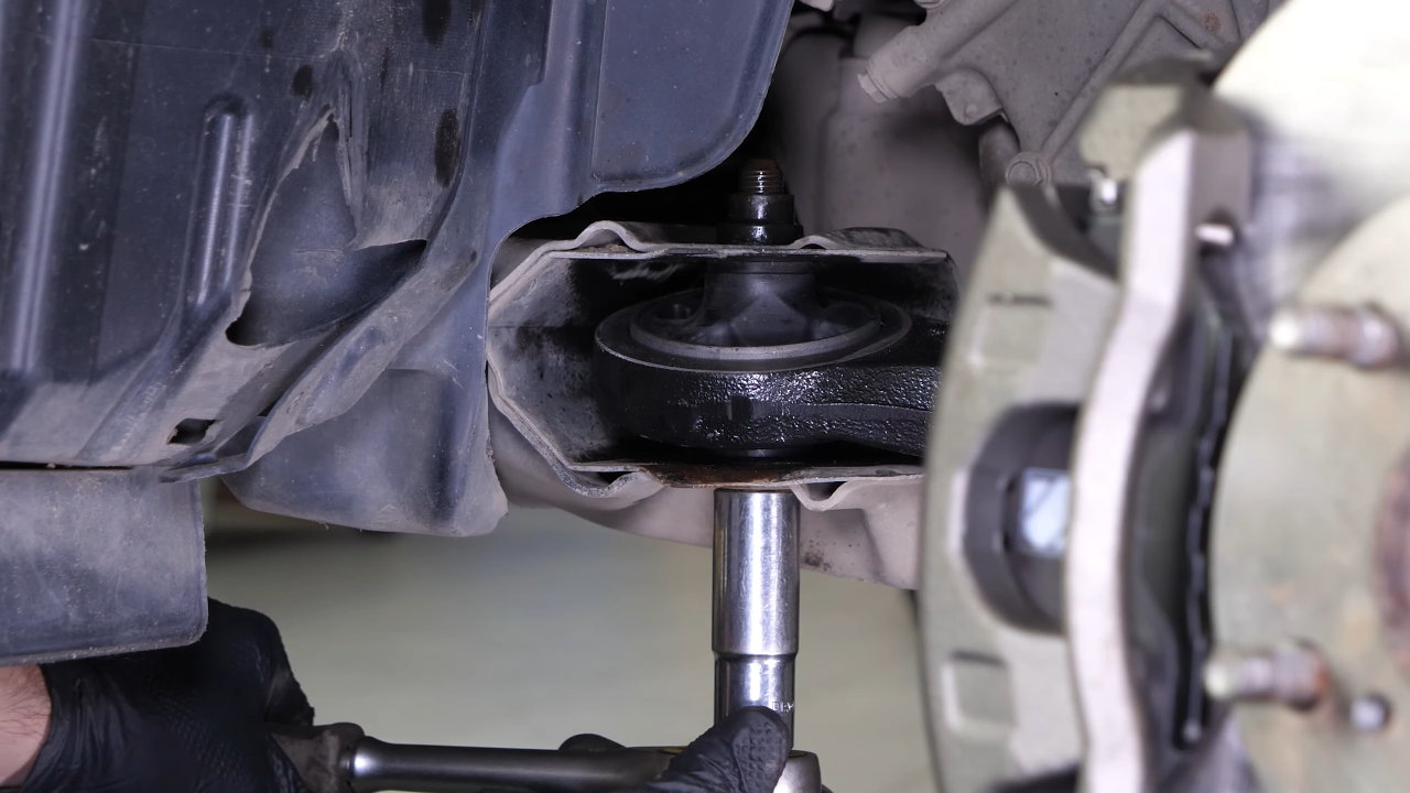 Put the control arm back