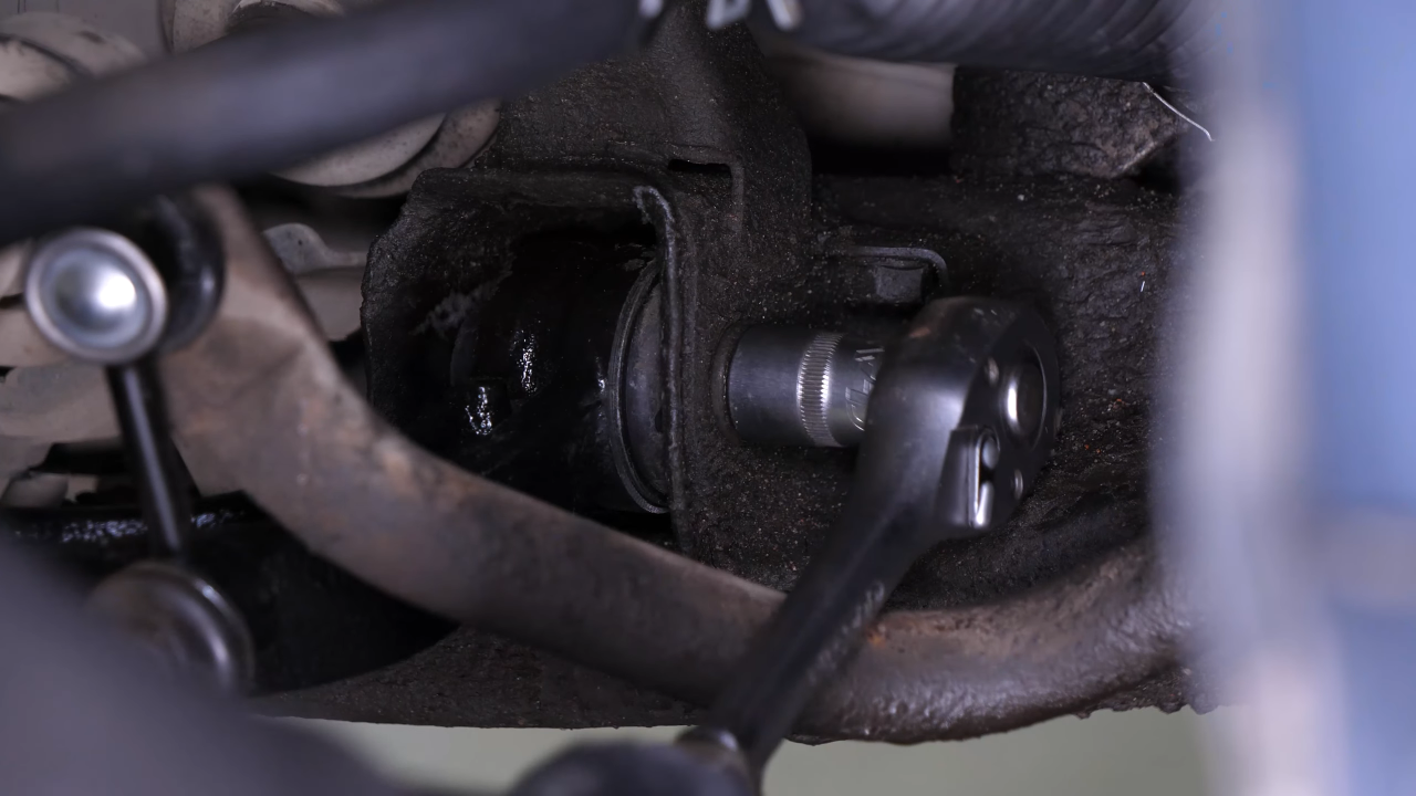 Put the control arm back