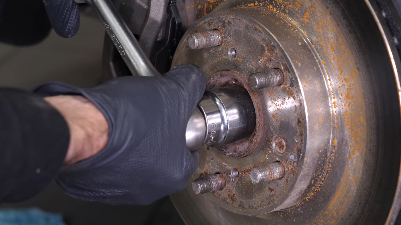 Remove the wheel hub nut