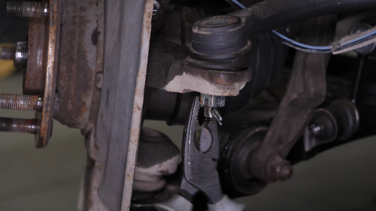 Remove the outer tie rod