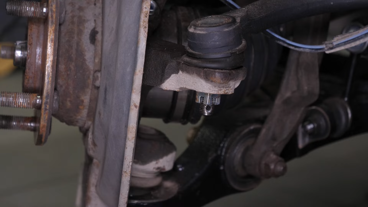 Remove the outer tie rod