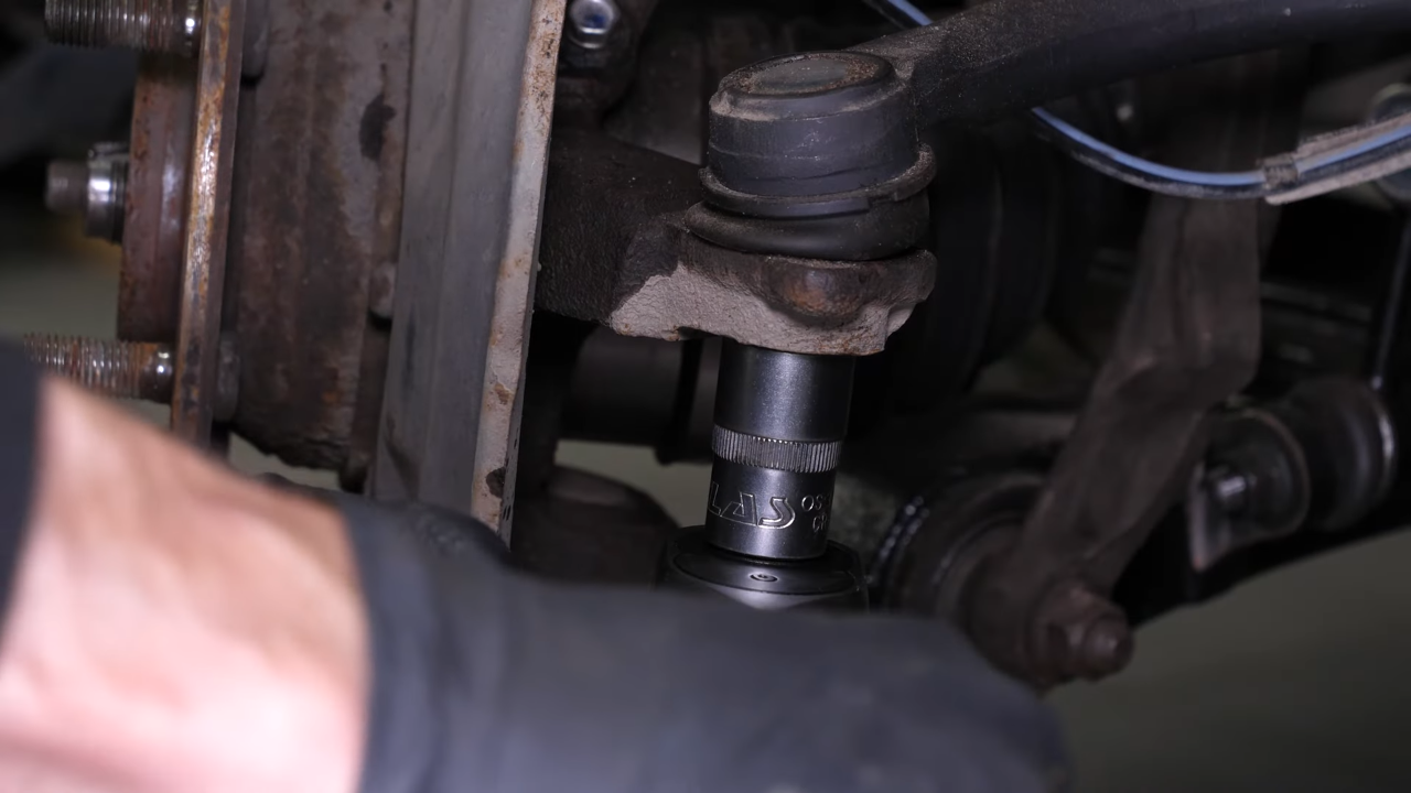 Remove the outer tie rod