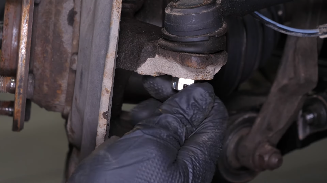 Remove the outer tie rod