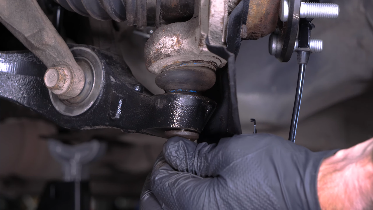 Put the wheel knuckle back