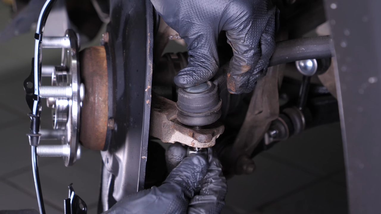 Put the outer tie rod back