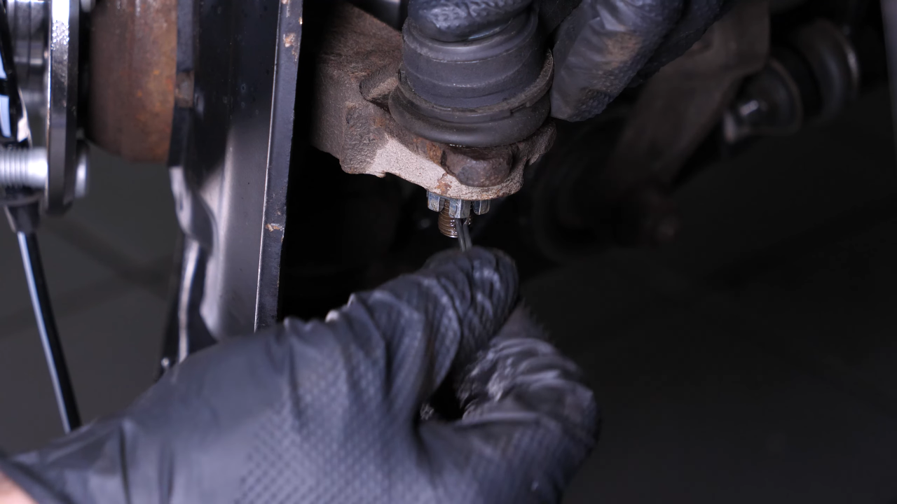 Put the outer tie rod back