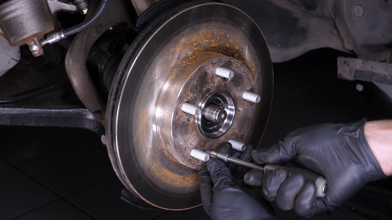 Put the outer tie rod back