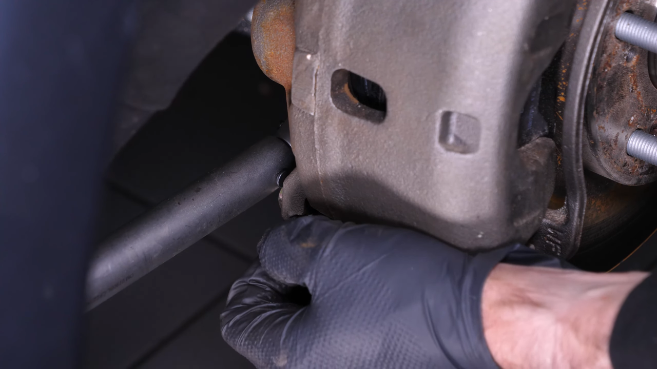 Put the outer tie rod back