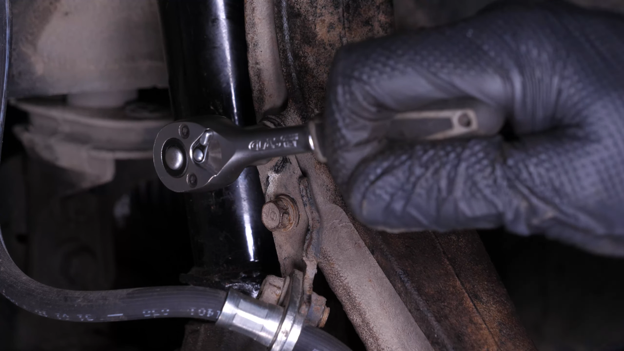 Put the outer tie rod back