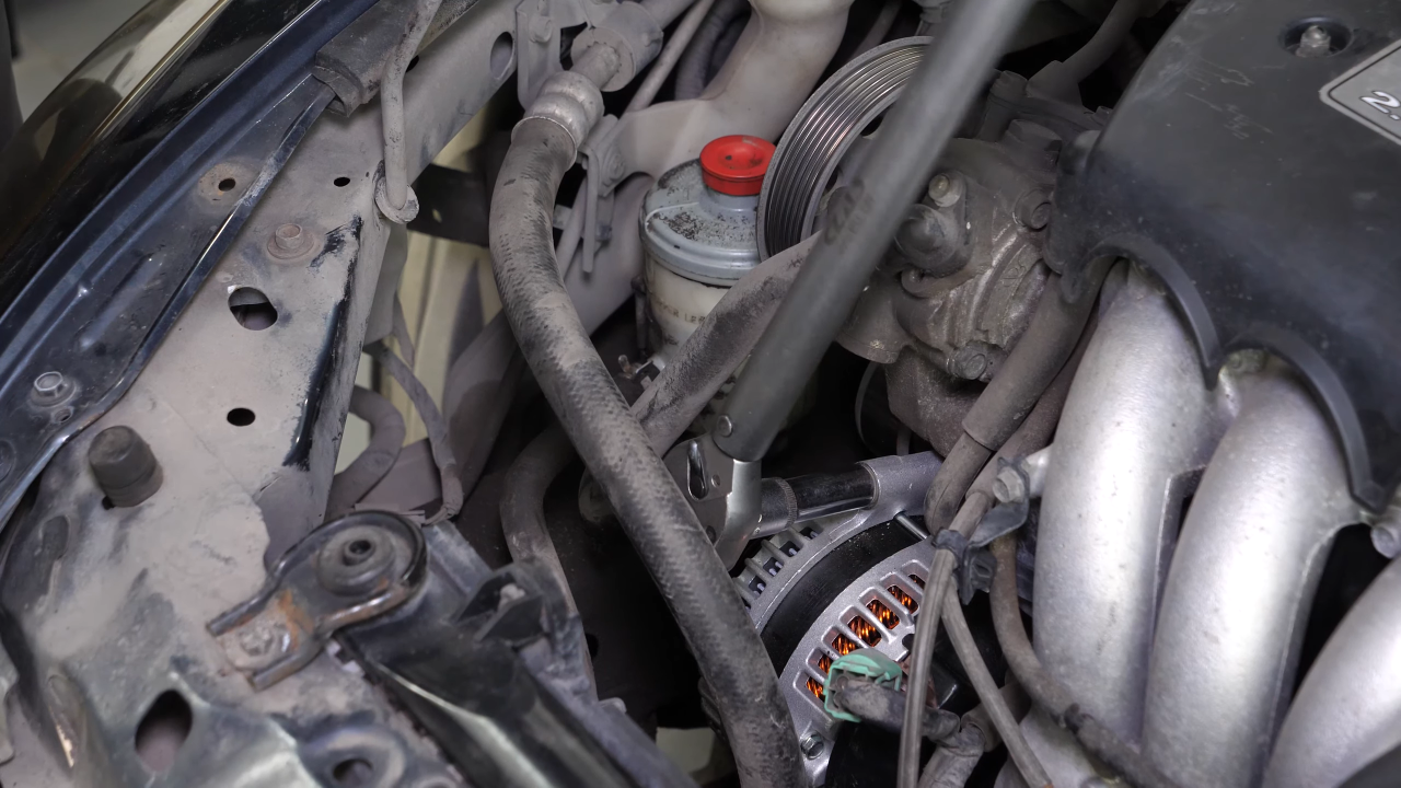 Put the alternator back in place
