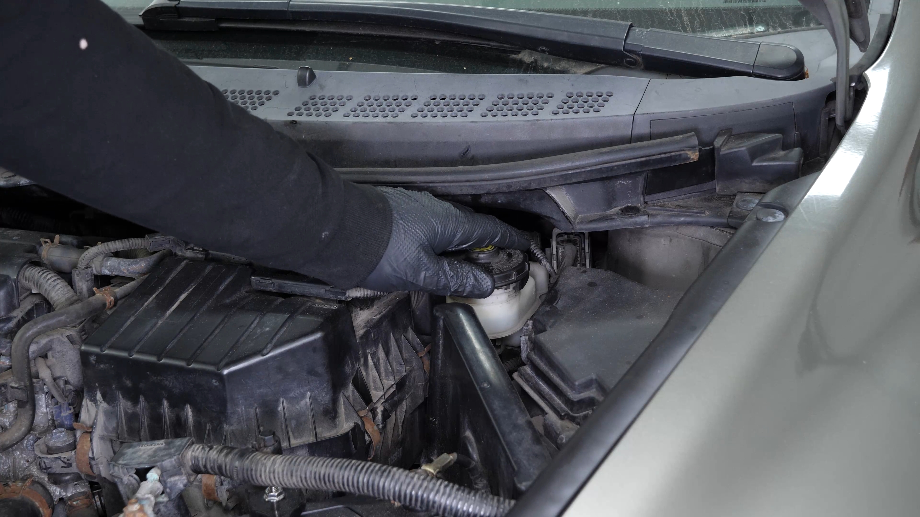 Open the brake fluid reservoir