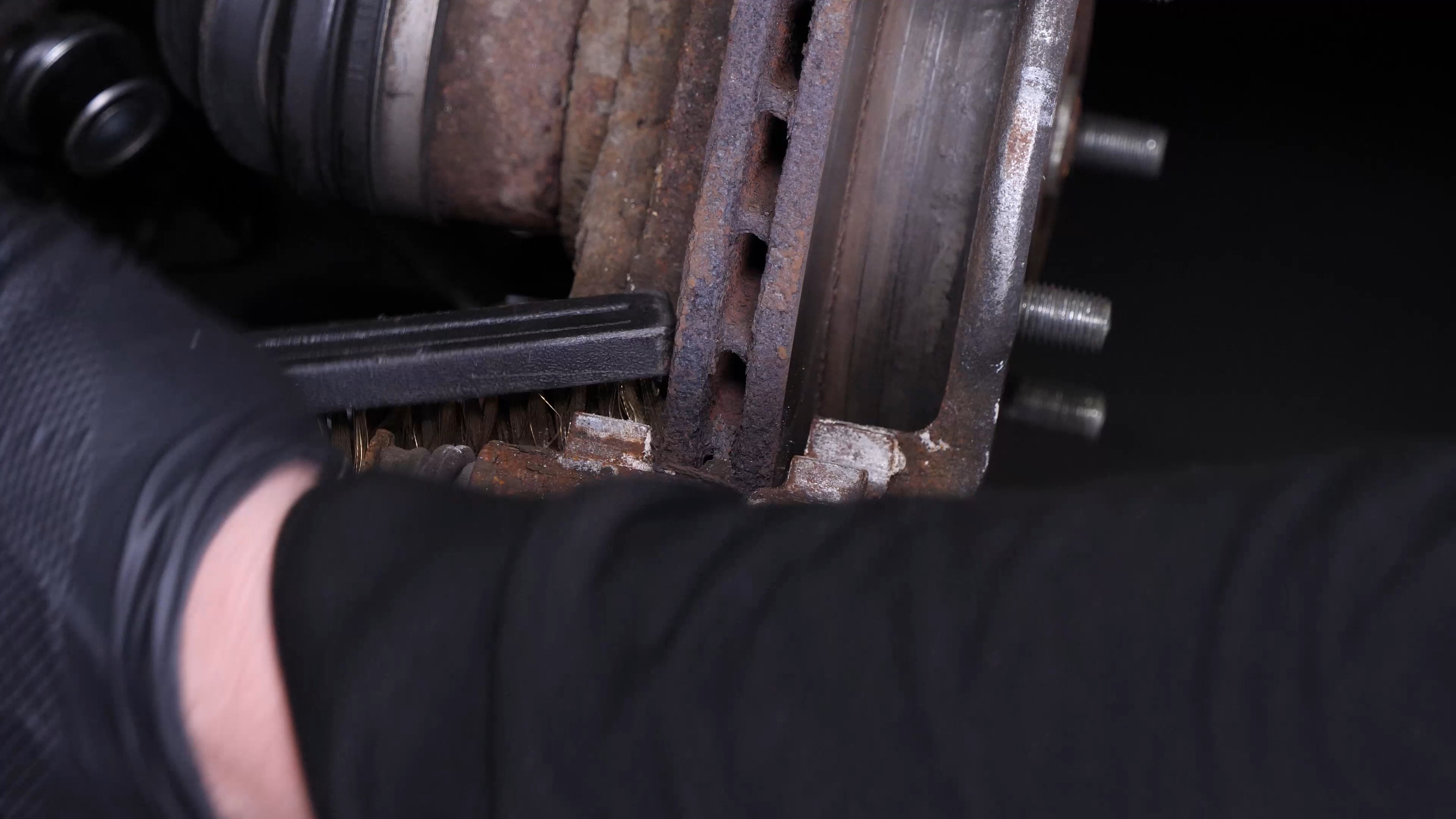 Clean the brake caliper mount