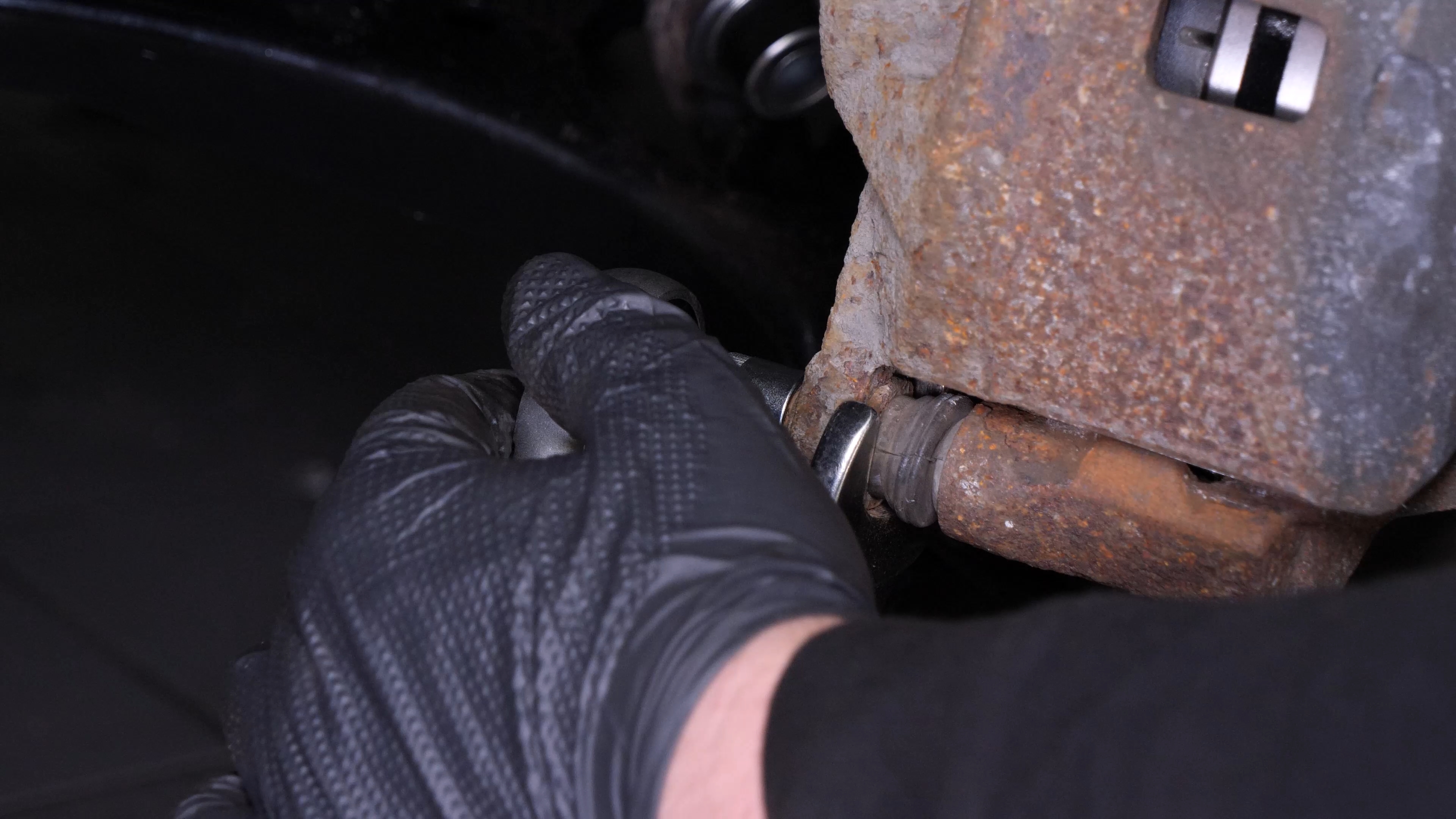 Put the brake caliper back
