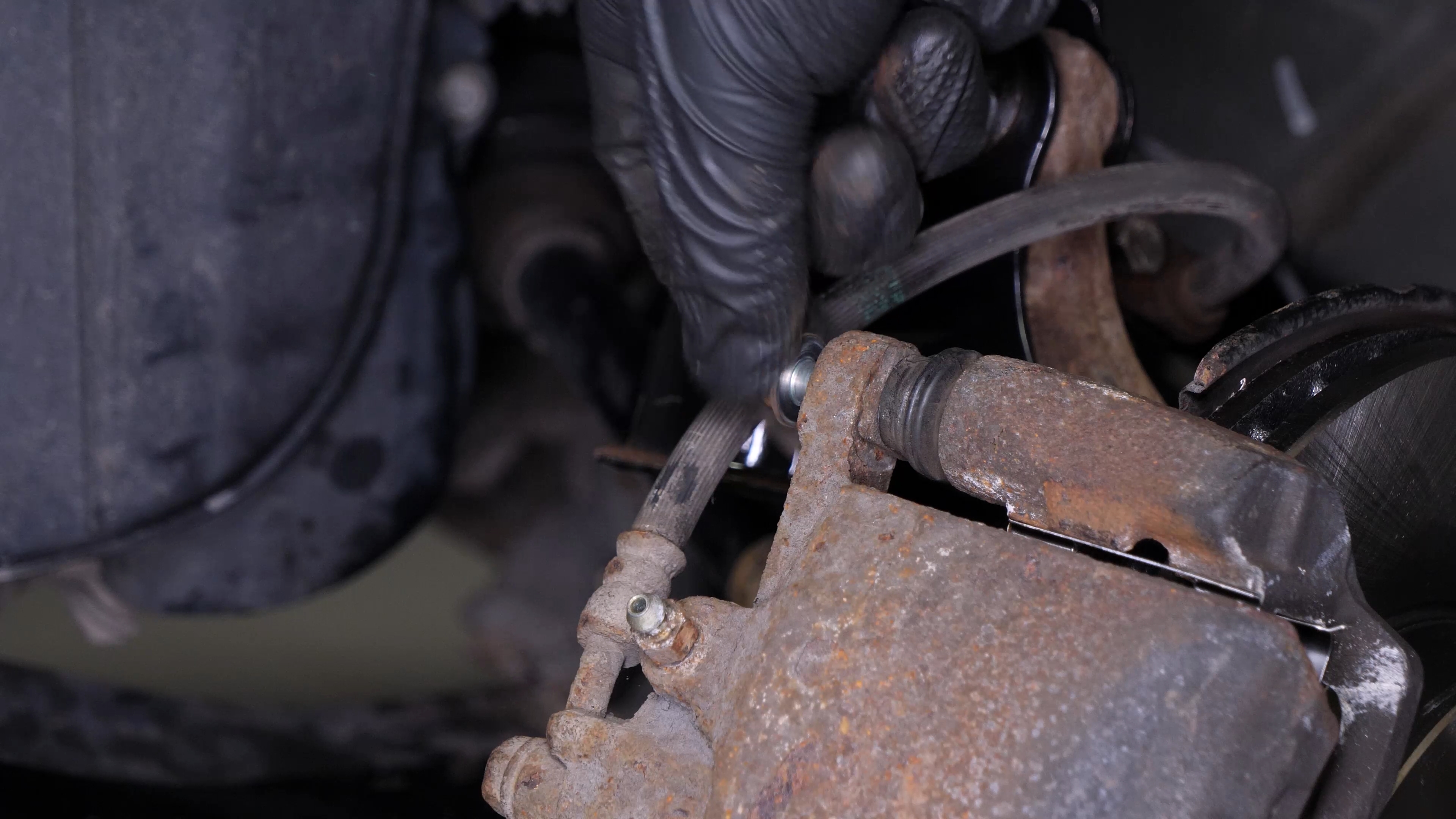 Put the brake caliper back