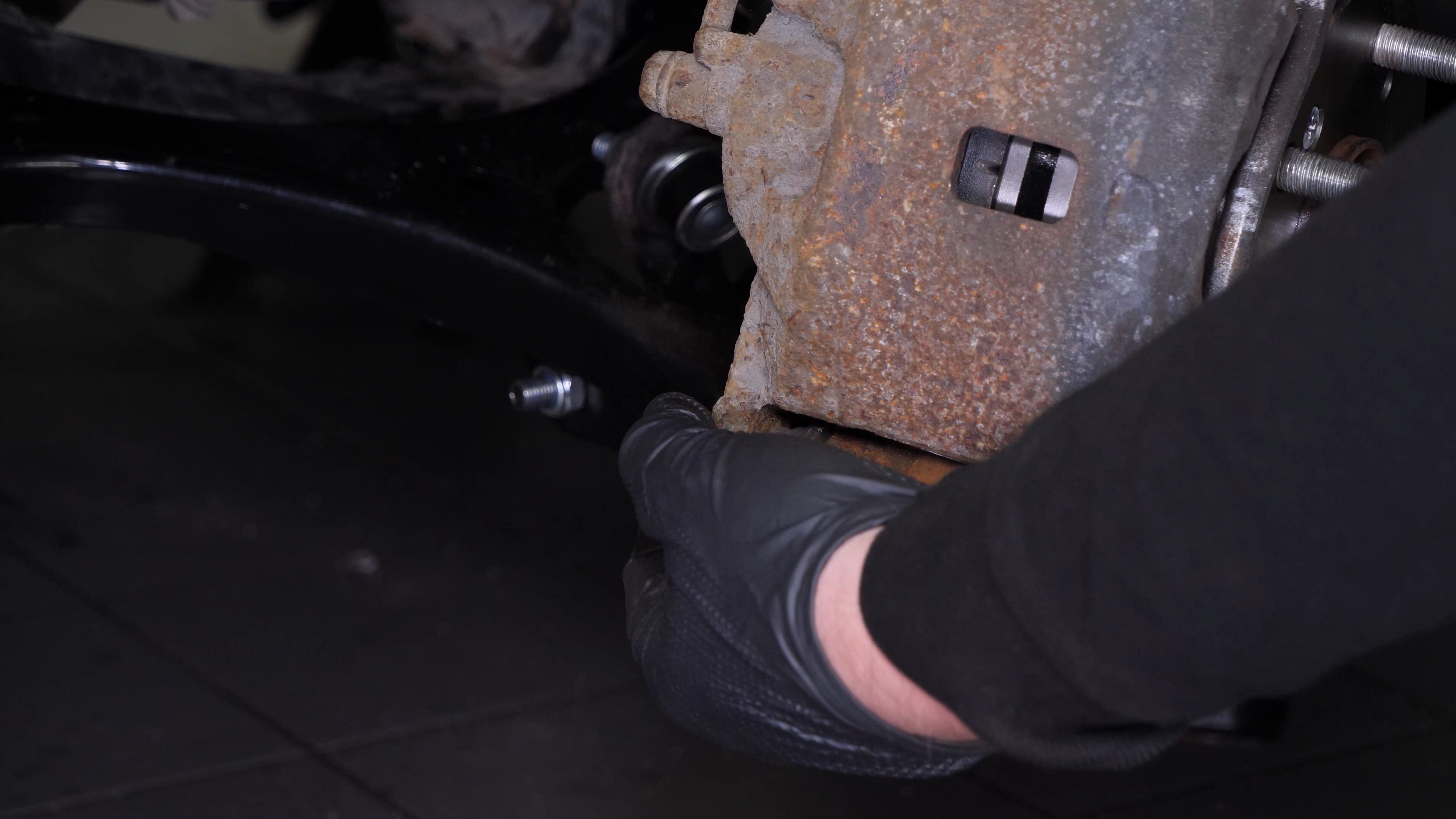 Put the brake caliper back