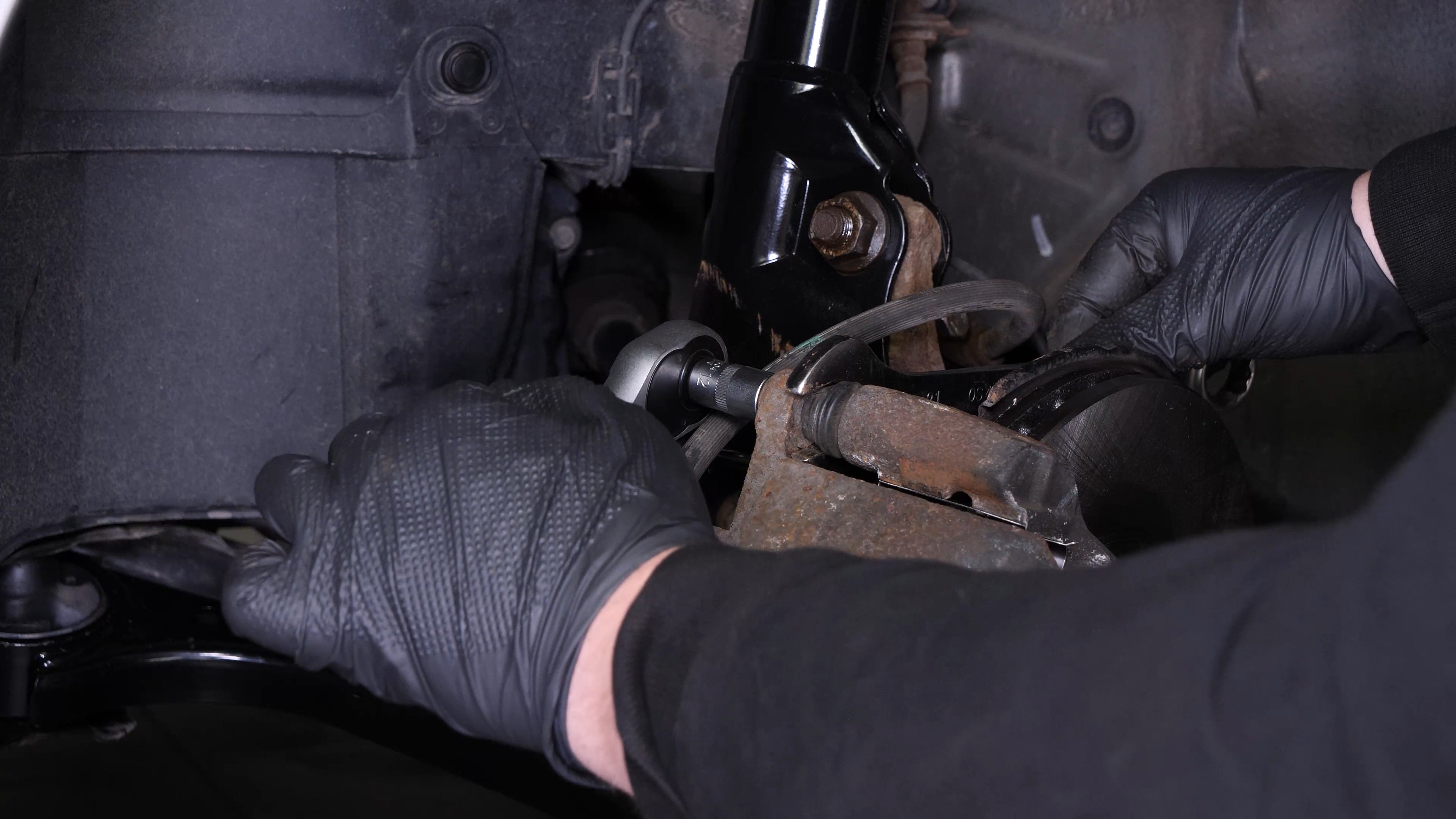 Put the brake caliper back