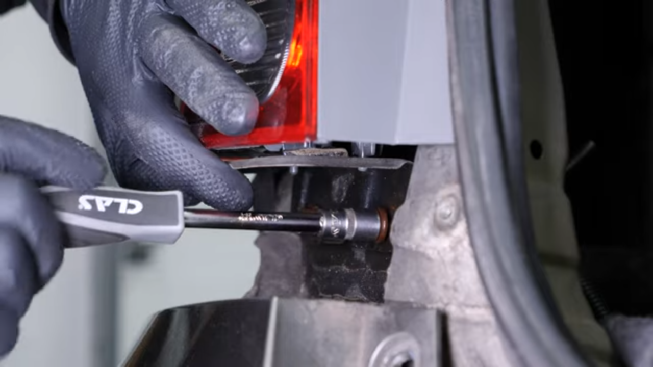 Put the tail light housing back