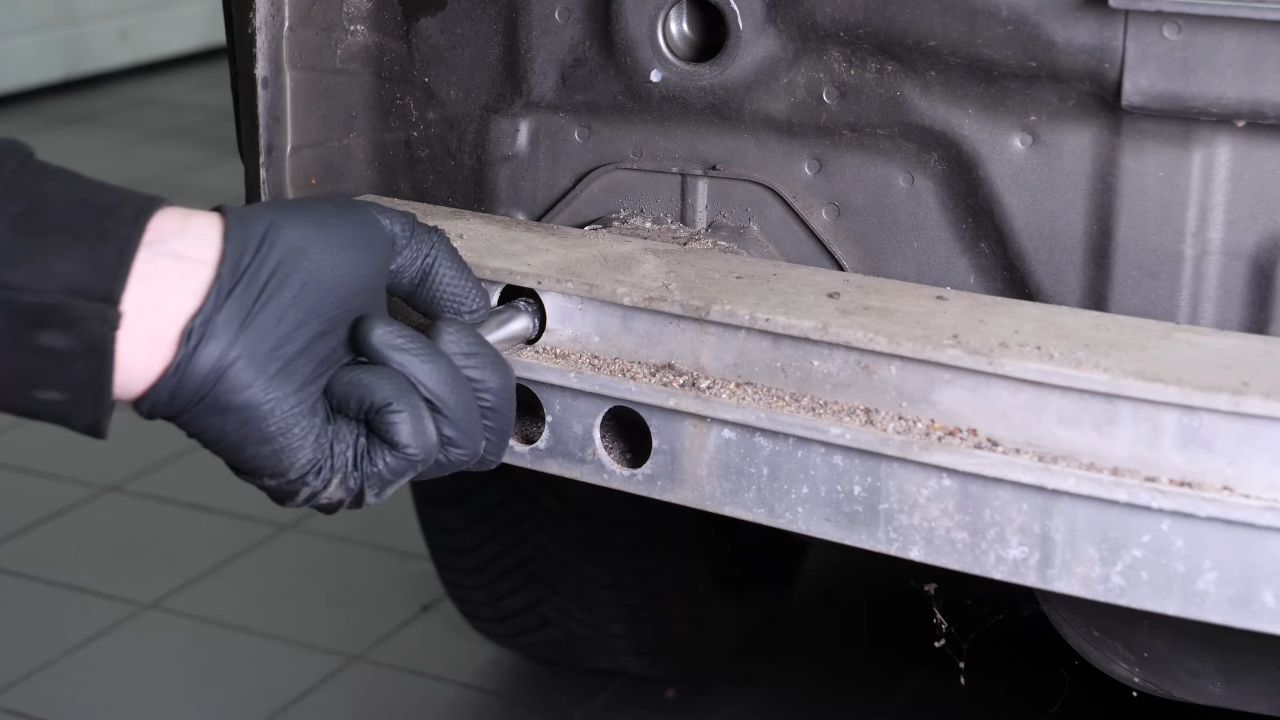 Remove the rear bumper reinforcement