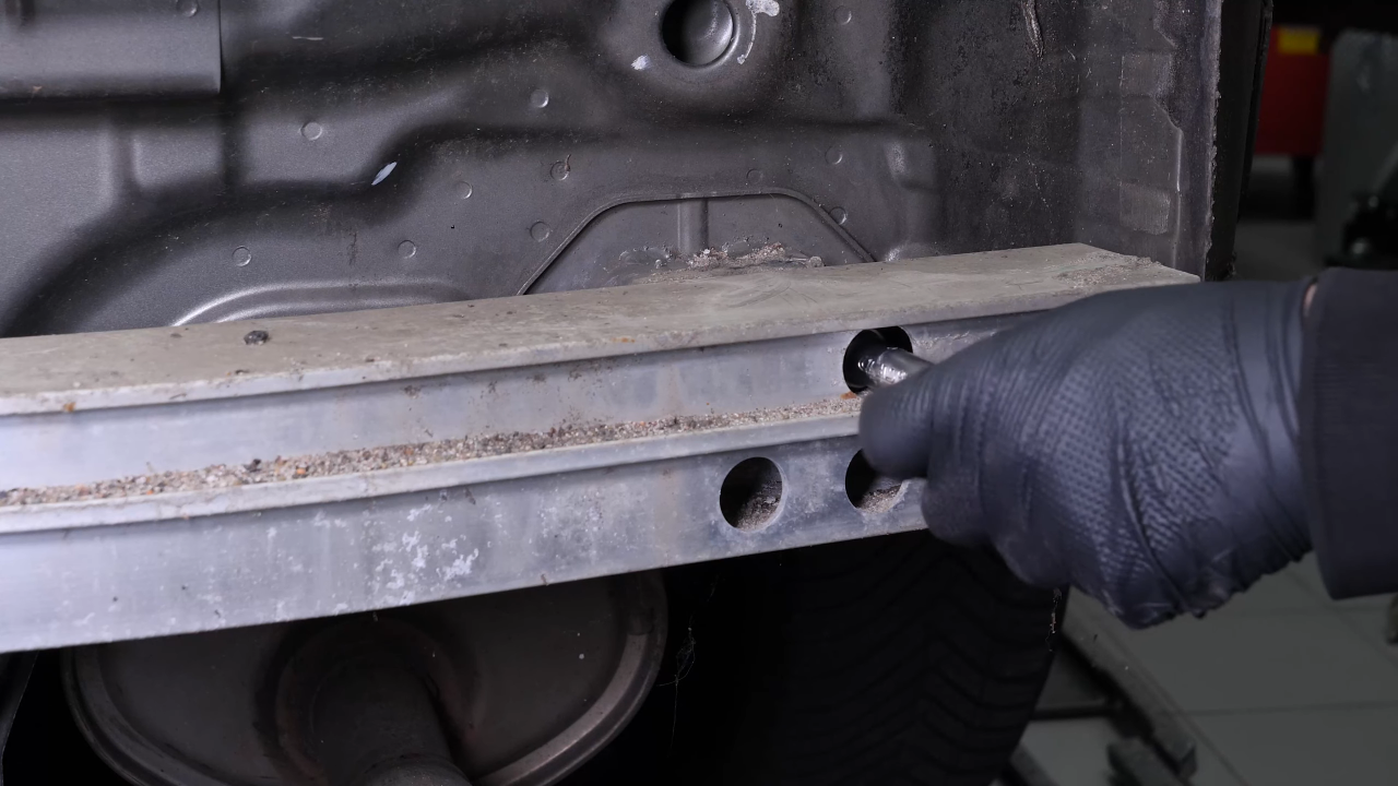Remove the rear bumper reinforcement