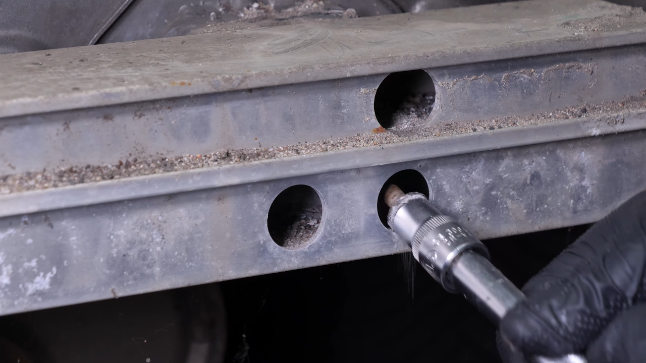 Remove the rear bumper reinforcement