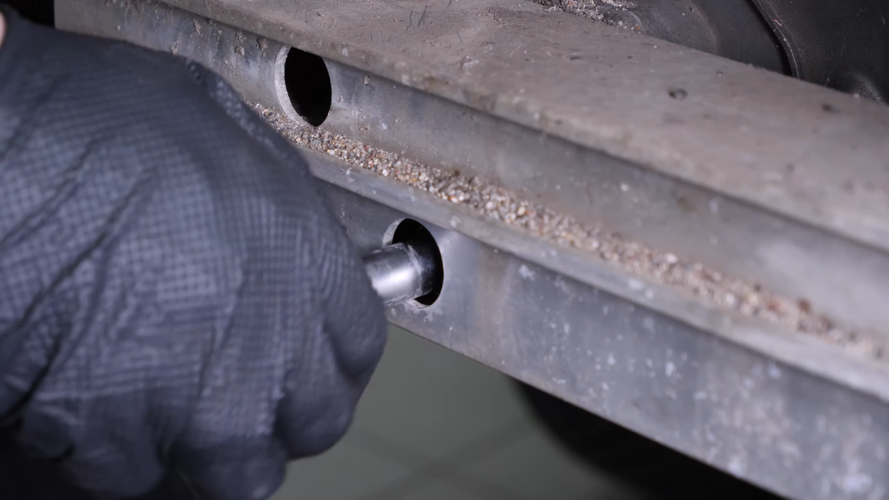 Remove the rear bumper reinforcement
