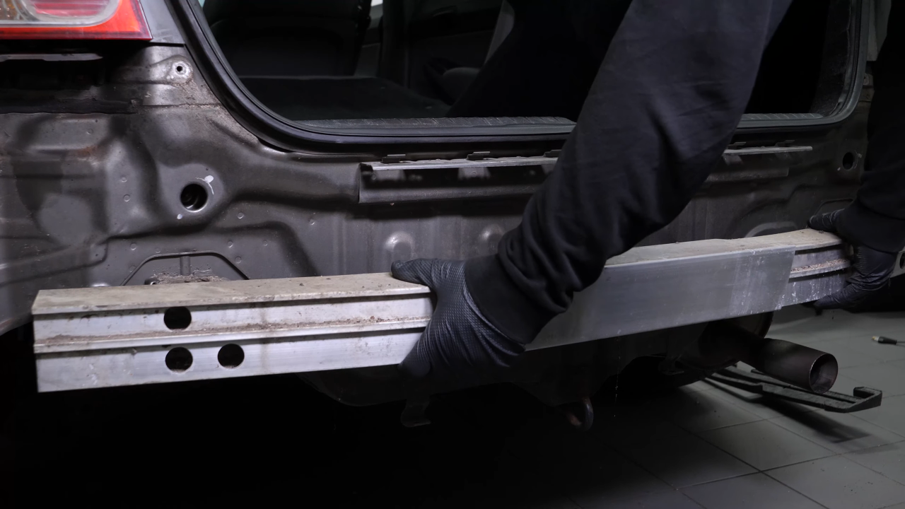 Remove the rear bumper reinforcement