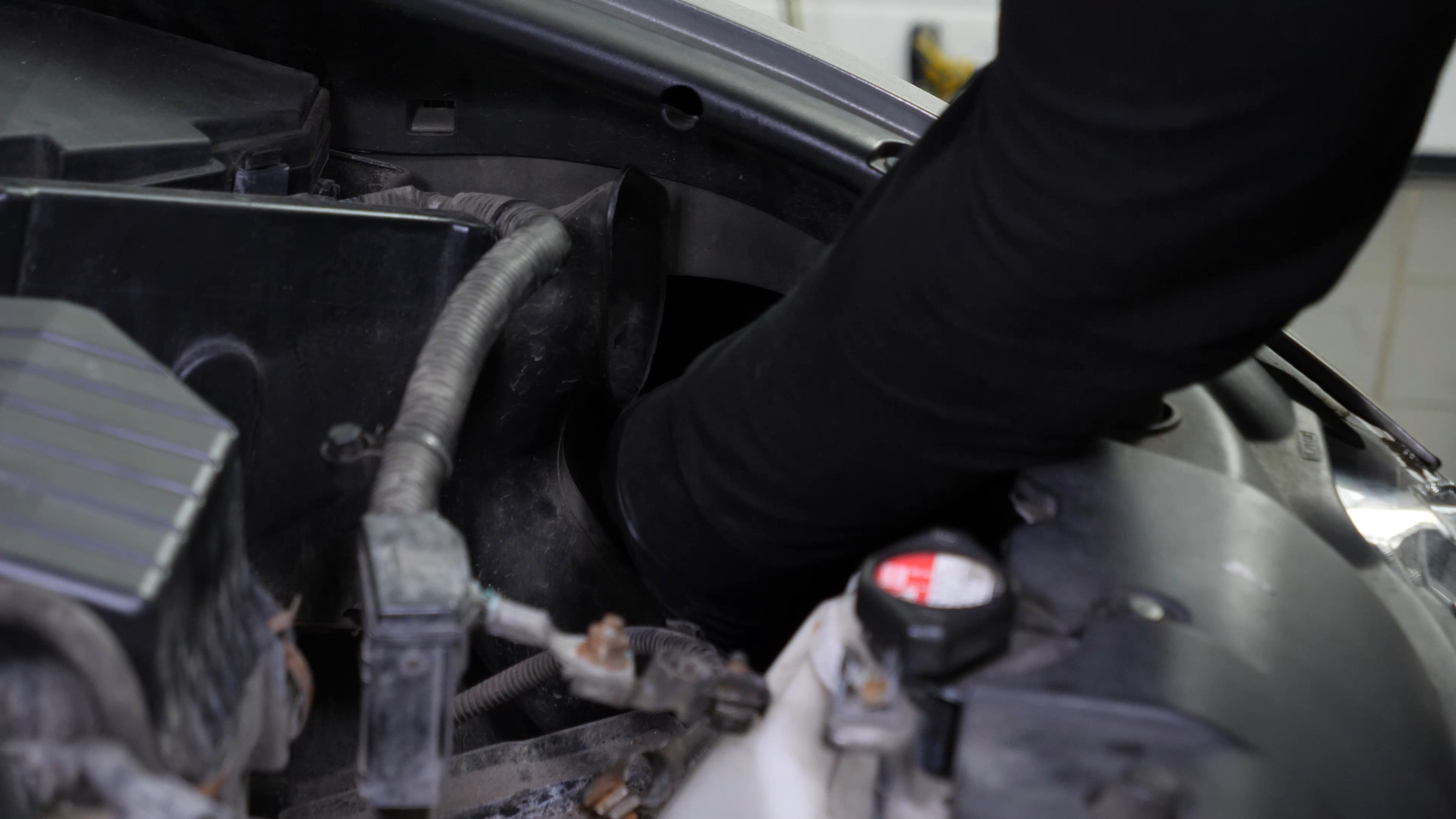 Replace the low beam bulb