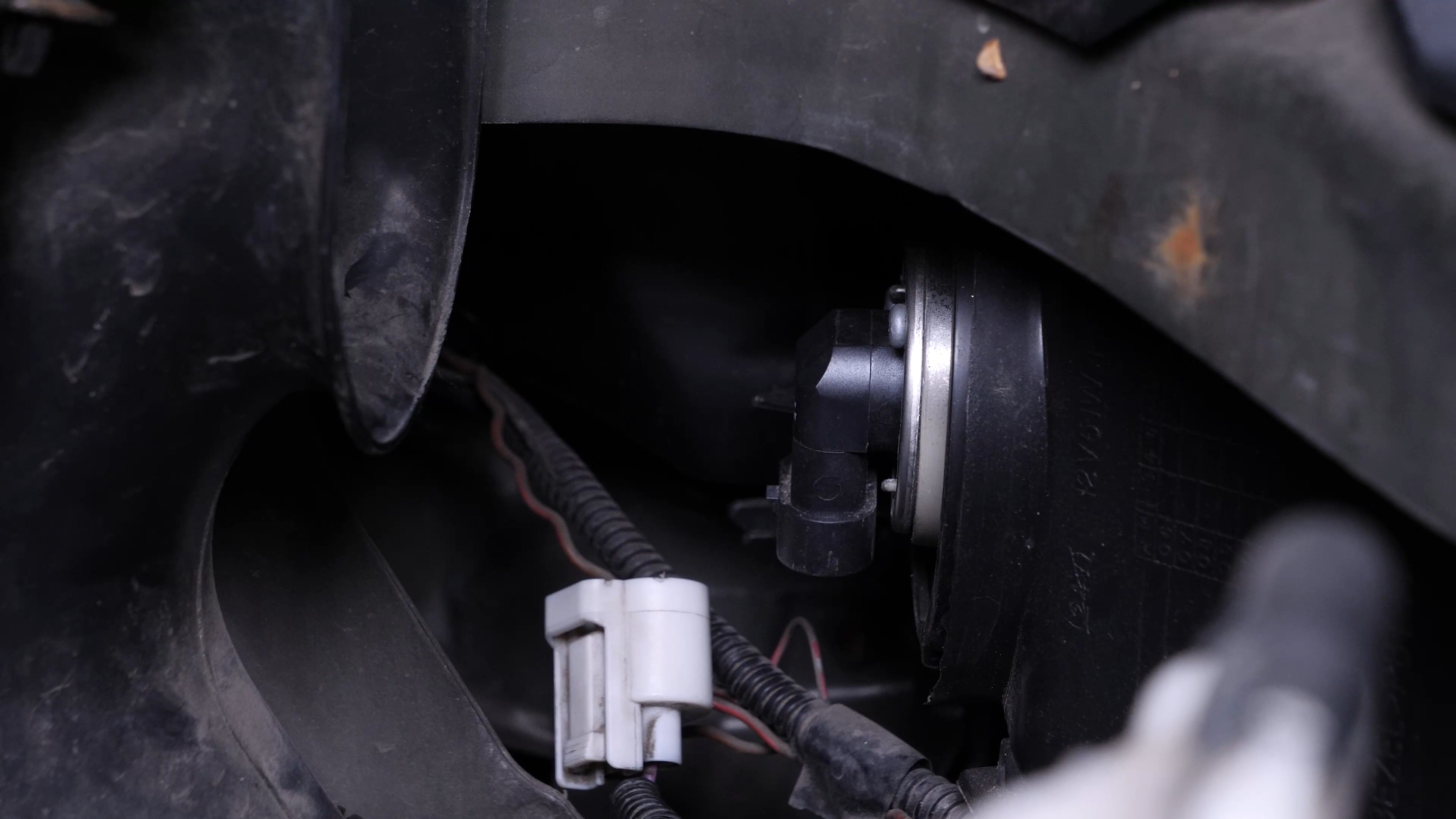 Replace the low beam bulb