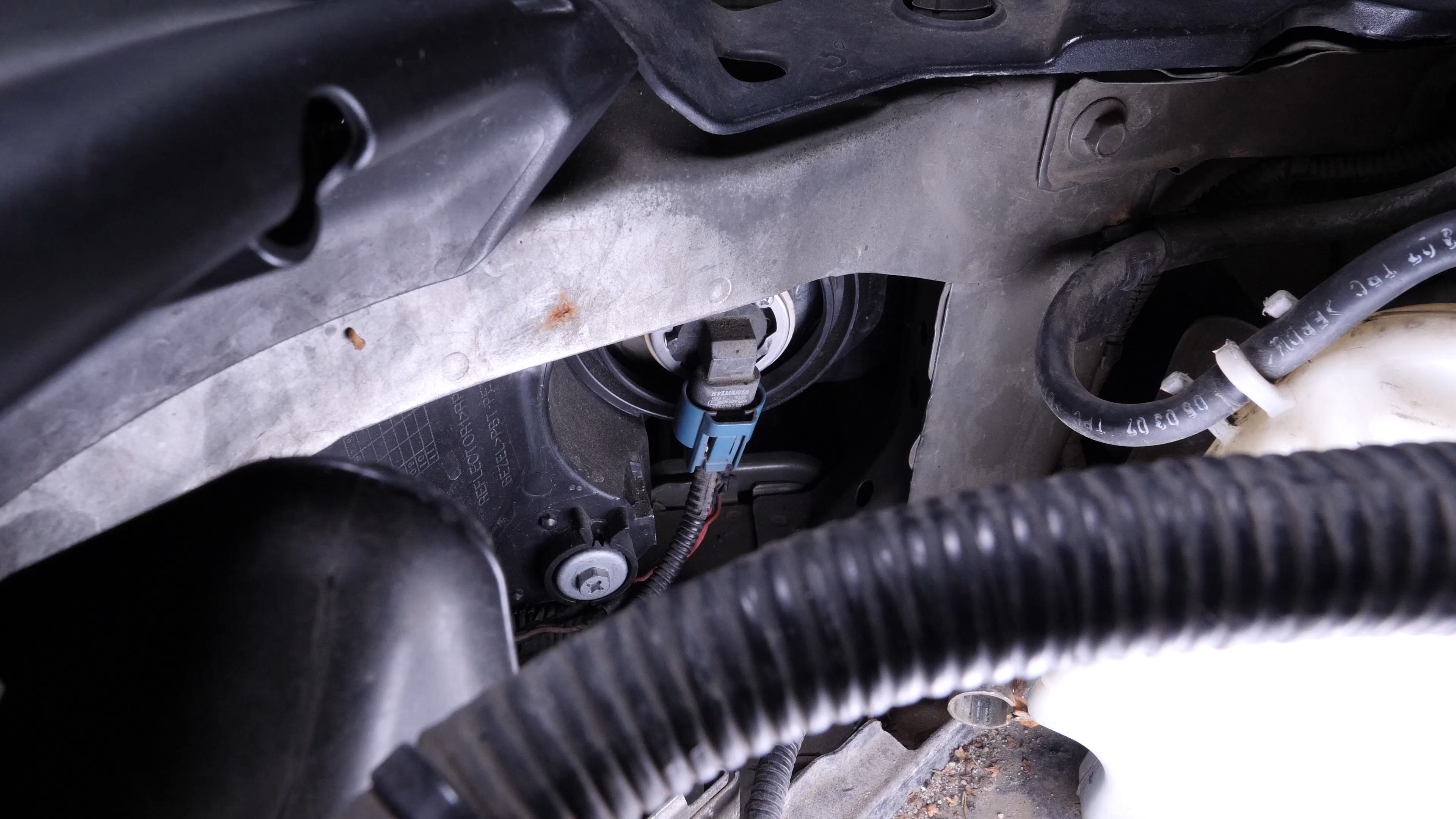 Replace the high beam bulb