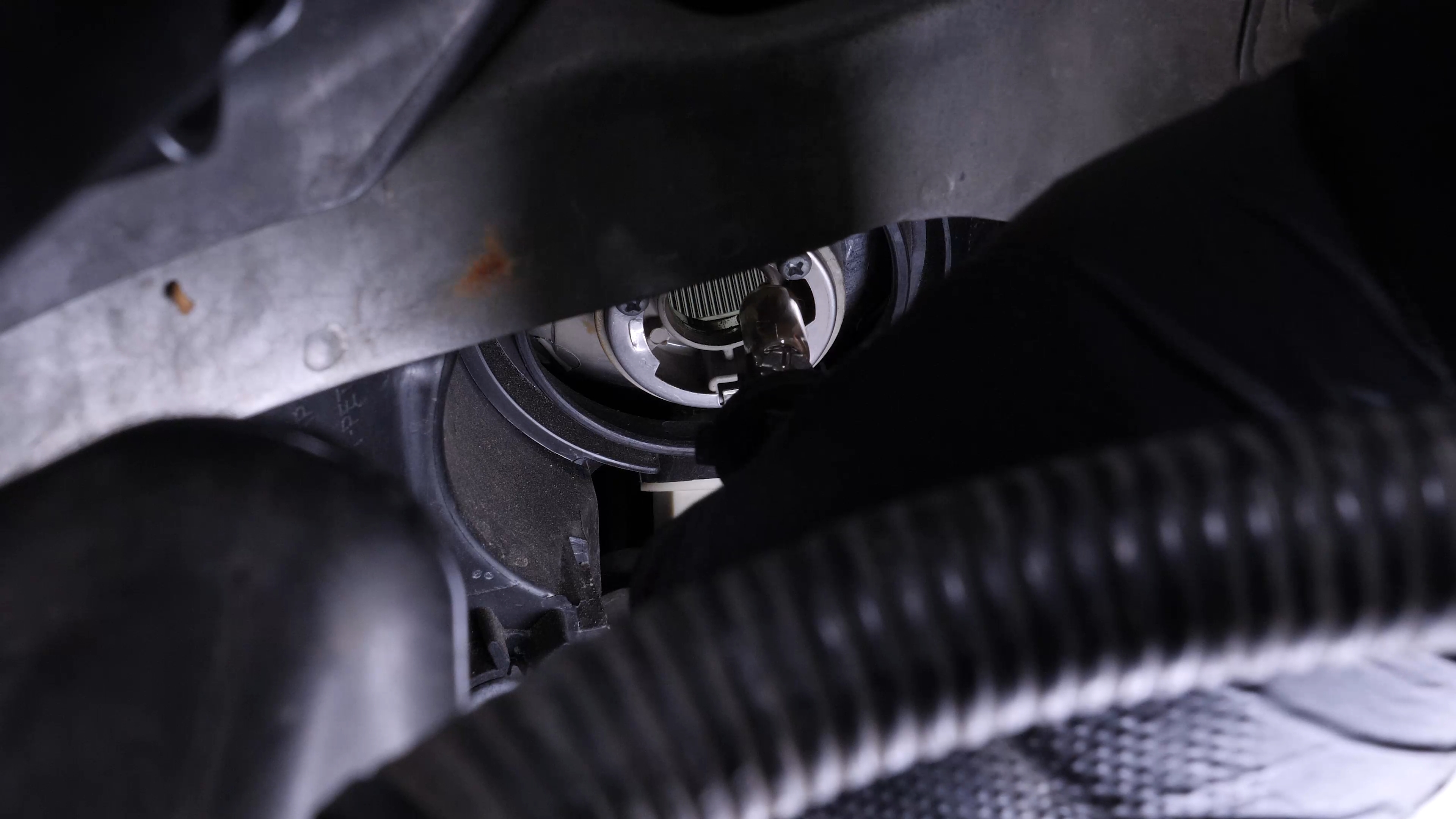 Replace the high beam bulb