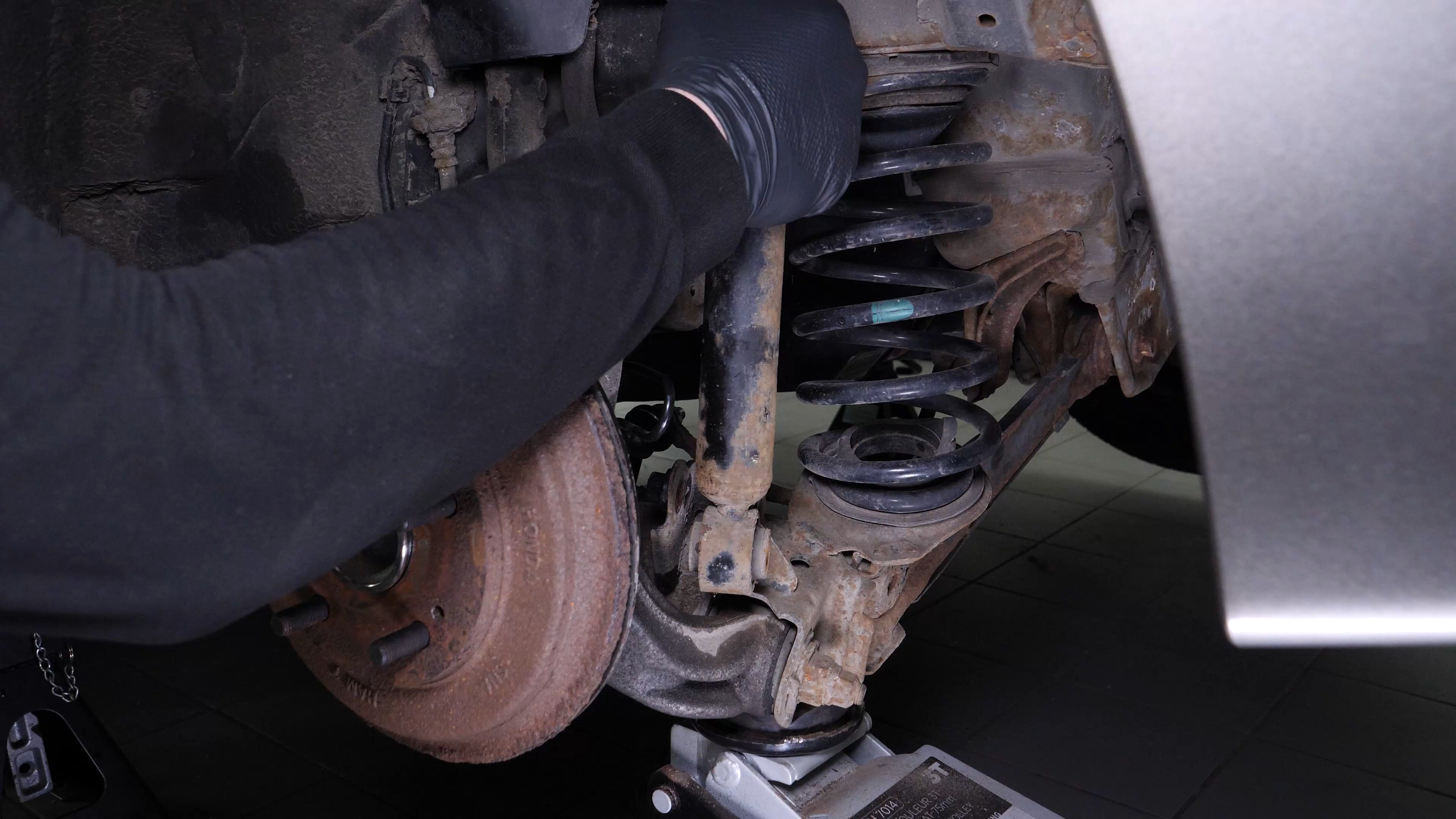Remove the shock absorber